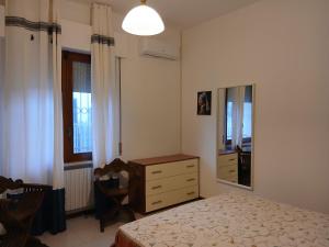 Ένα ή περισσότερα κρεβάτια σε δωμάτιο στο Casa Adria