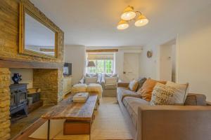 Posezení v ubytování The Secret Cottage