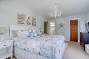 Ένα ή περισσότερα κρεβάτια σε δωμάτιο στο Salt Life Cottage