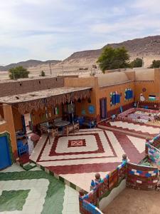 an aerial view of a building in the desert at Miral Nubian House in Aswan