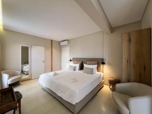 Ένα ή περισσότερα κρεβάτια σε δωμάτιο στο Viva Properties