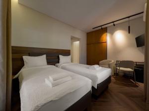 Ένα ή περισσότερα κρεβάτια σε δωμάτιο στο Viva Properties +41 φωτογραφίες