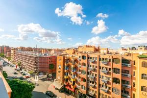 Nespecifikovaný výhled na destinaci Marakéš nebo výhled na město při pohledu z apartmánu