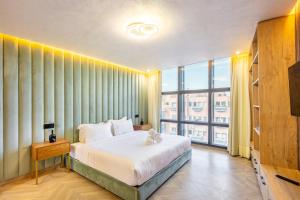 Postel nebo postele na pokoji v ubytování AYLAL Marrakech