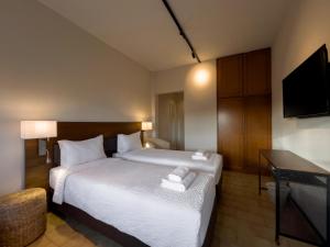 Ένα ή περισσότερα κρεβάτια σε δωμάτιο στο Viva Properties