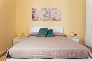 Ένα ή περισσότερα κρεβάτια σε δωμάτιο στο Alexas rooms Crotone