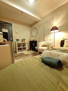 Ένα ή περισσότερα κρεβάτια σε δωμάτιο στο Le Berkane