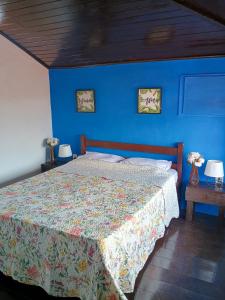 Ένα ή περισσότερα κρεβάτια σε δωμάτιο στο Refugio de Mar