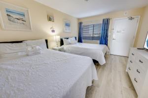 Postel nebo postele na pokoji v ubytování Romantic Oceanfront View, Discounted, Pools + 46 fotografií