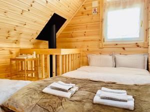 Ένα ή περισσότερα κρεβάτια σε δωμάτιο στο 山中湖レイクサイド1号館