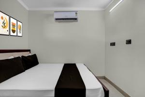 Postel nebo postele na pokoji v ubytování Hotel O Prince + 51 fotografií