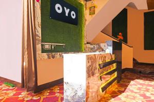 TV a/nebo společenská místnost v ubytování Hotel O Priyal