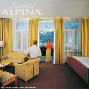 Postel nebo postele na pokoji v ubytování Hotel Alpina