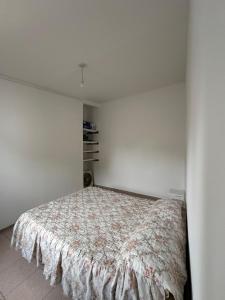 En eller flere senge i et værelse på Departamento limón + 8 billeder