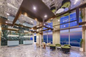 Posezení v ubytování Dalian Zhongshan Square Seaview Meilun Hotel