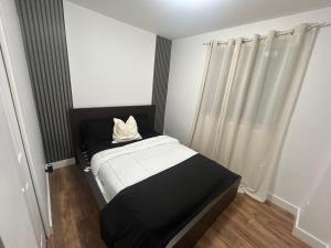 Ένα ή περισσότερα κρεβάτια σε δωμάτιο στο Luxury Sweet Home +12 φωτογραφίες