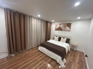 Ένα ή περισσότερα κρεβάτια σε δωμάτιο στο Luxury Sweet Home