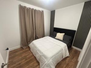 Ένα ή περισσότερα κρεβάτια σε δωμάτιο στο Luxury Sweet Home