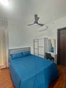 En eller flere senge i et værelse på K-Avenue Mumui's Homestay