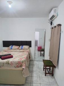 Postel nebo postele na pokoji v ubytování Casa completa em Olinda