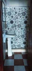 Ένα μπάνιο στο Habitación Compartida Tipo Hostel para los más aventureros