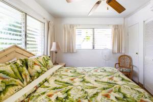 En eller flere senge i et værelse på Affordable Vacation Accommodations in Maui at the Kihei Kai Nani Resort + 23 billeder