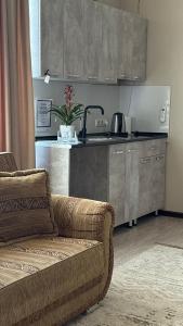 Kuchyň nebo kuchyňský kout v ubytování Meiman House close to Asia Mall