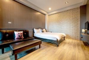 Ένα ή περισσότερα κρεβάτια σε δωμάτιο στο 蘭陽河畔 Awake 三館丨宜蘭包棟丨寵物友善