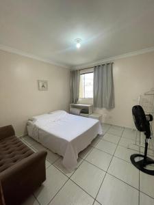 Postel nebo postele na pokoji v ubytování Apartamento Luzza - 2 quartos