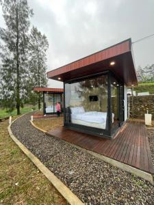 Κήπος έξω από το Kayana Capsul Dieng