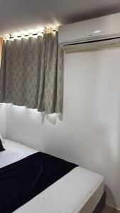 Ένα ή περισσότερα κρεβάτια σε δωμάτιο στο Moderno apartamento amoblado 2 habitaciones