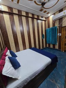 Postel nebo postele na pokoji v ubytování Vedic Villa