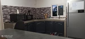 Η κουζίνα ή μικρή κουζίνα στο Chez Thierry et Alexandra