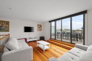 Et opholdsområde på Blue Tides Getaway