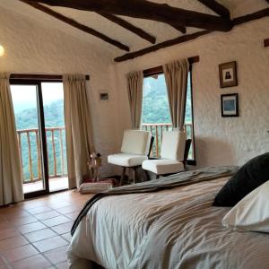 Postel nebo postele na pokoji v ubytování Posada Iglesia Vieja