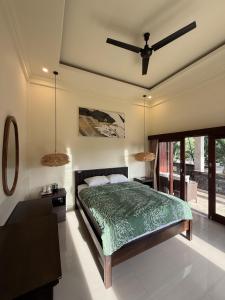 Ένα ή περισσότερα κρεβάτια σε δωμάτιο στο Murni’s House