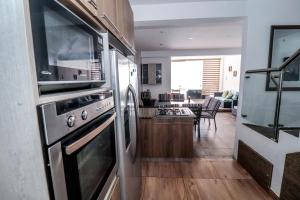 Η κουζίνα ή μικρή κουζίνα στο Cerro Azul Alojamiento