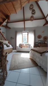 Ένα ή περισσότερα κρεβάτια σε δωμάτιο στο Le Clau Des Cerisiers