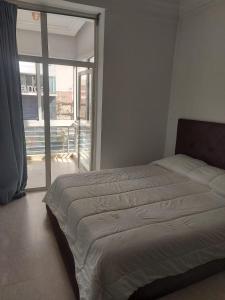 Ένα ή περισσότερα κρεβάτια σε δωμάτιο στο Gauthier One