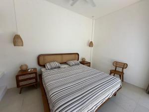 Giường trong phòng chung tại Modern 2BR Private Pool Villa in Uluwatu Pecatu