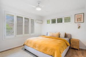 Ένα ή περισσότερα κρεβάτια σε δωμάτιο στο Cedar Beach House