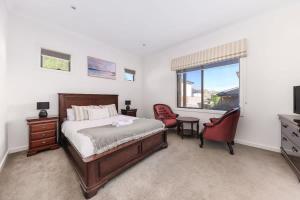 Ένα ή περισσότερα κρεβάτια σε δωμάτιο στο Welcome home Burwood
