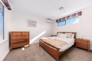 Ένα ή περισσότερα κρεβάτια σε δωμάτιο στο Welcome home Burwood