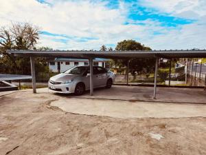 a car parked under a covered parking lot at City Circle in Suva