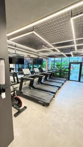 ブラジリアにあるResidencial New Yorkのジム(トレッドマシン付)