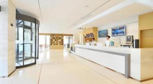 lobby szpitala z recepcją w obiekcie City Comfort Inn Wuhan Huangpi Xiangyang Avenue Panlong w mieście Wuhan