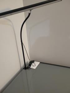 a black wire on a table in a room at Townhome Near Northwestern and Hospital in Evanston