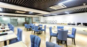 Foto sihtkohas Xinxing asuva majutusasutuse Borrman Hotel Yunfu Xinxing County Bus Station galeriist