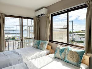 Giường trong phòng chung tại #43 凪-Nagi-