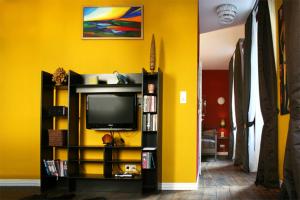 TV a/nebo společenská místnost v ubytování Strumpfeck Suites